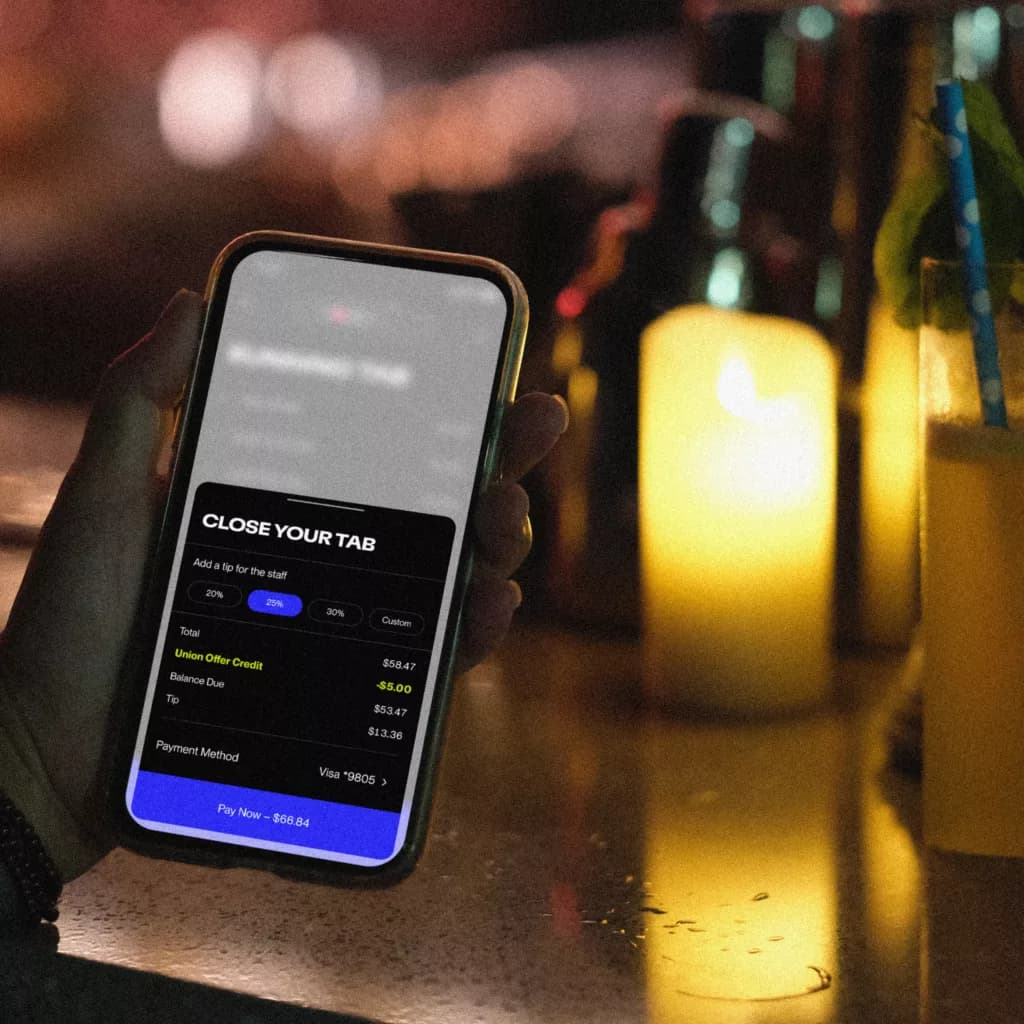 Guest pays with phone at the table