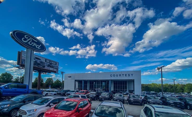 Courtesy Automotive Groups dealership exterior, Omega client testimonial