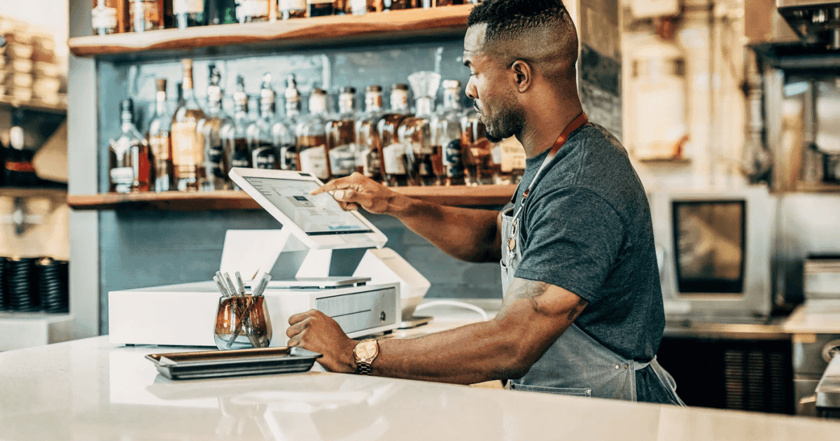 Atlanta restaurant Clover POS terminal at host stand table service tips kitchen display