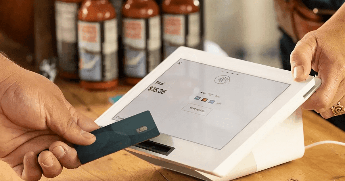 Georgia small business owner exploring Square alternatives at retail shop, merchant services interchange-plus Atlanta metro