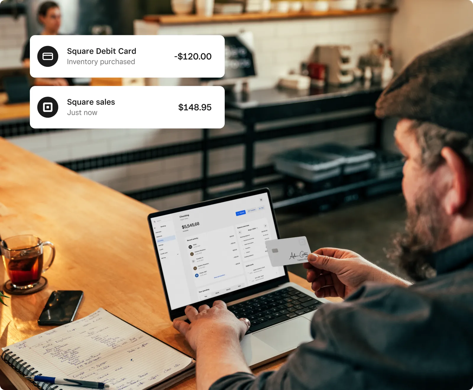 Laptop in a café representing Square business tools in daily operations