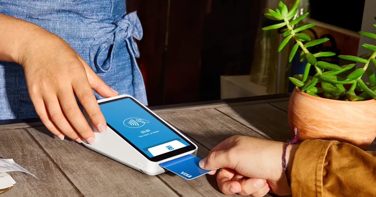 Chip card inserted into Square Terminal on a counter
