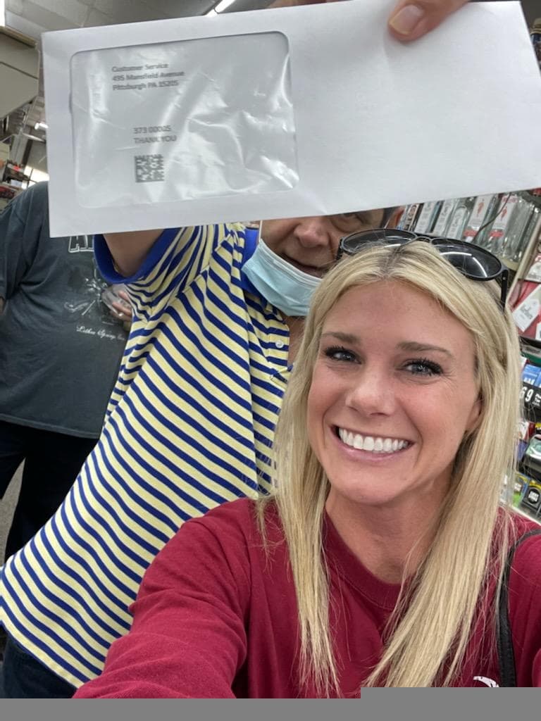 Merchant customers with thank-you rewards mailing from Omega rewards program, Americus, Georgia